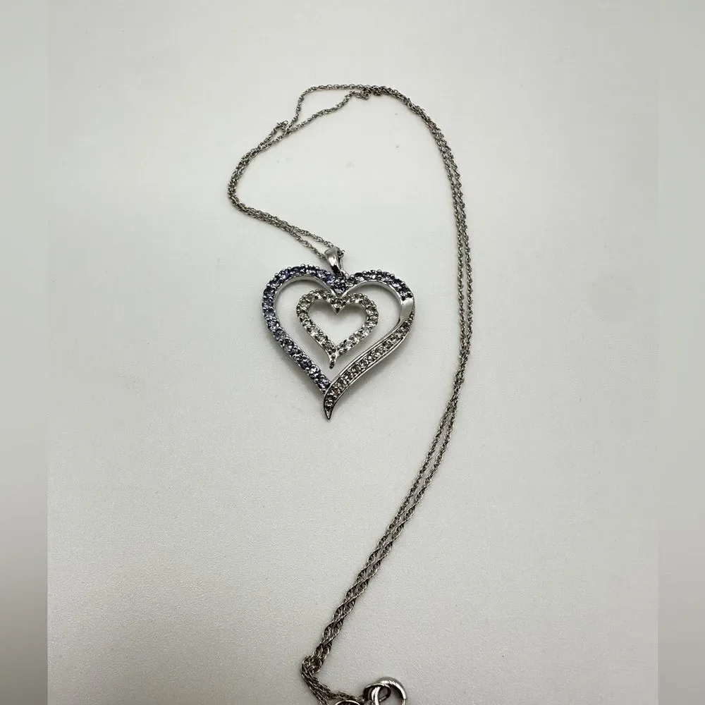 Genuine 1.5ctw tanzanite and‎ CZ accent heart necklace in sterling silver!